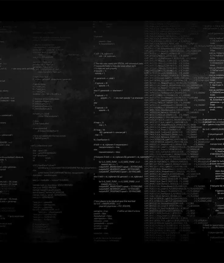 Dark background with white, blurred text resembling computer code or a data dump.